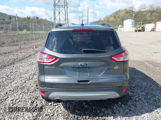 2016 Ford Escape SE with VIN 1FMCU9GX5GUA06660, listed as a IAAI auction lot 42043031 with 87,719 mi miles. Bid and sale history available at carsss.com. Image 16.