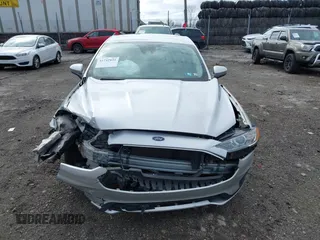 2019 Ford Fusion Hybrid SE with VIN 3FA6P0LU9KR104886, listed as a IAAI auction lot 41742835 with 1 mi miles. Bid and sale history available at carsss.com. Image 11.