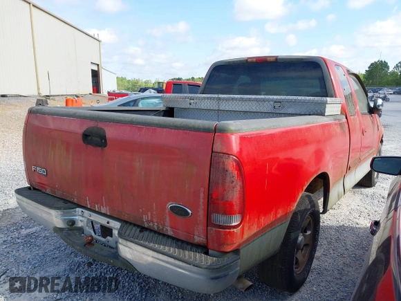 2002 Ford F-150 XL with VIN 1FTRX17W12NA07936, listed as a IAAI auction lot 42068598 with 1 mi miles. Bid and sale history available at carsss.com. Image 4.