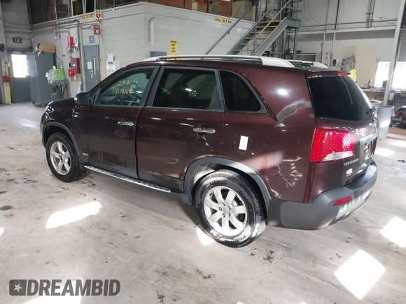 2012 Kia Sorento LX with VIN 5XYKTCA66CG264679, listed as a IAAI auction lot 41742682 with 161,781 mi miles. Bid and sale history available at carsss.com. Image 3.