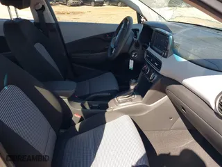 2021 Hyundai Kona SE with VIN KM8K12AA1MU705988, listed as a IAAI auction lot 41665055 with 52,719 mi miles. Bid and sale history available at carsss.com. Image 5.