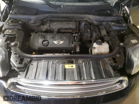 2015 MINI Countryman with VIN WMWZB3C53FWR43903, listed as a Copart auction lot 86384294 with 112,667 mi miles and Salvage Title. Bid and sale history available at DreamBid. Image 11.
