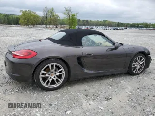 2015 Porsche Boxster with VIN WP0CA2A88FS120121, listed as a Copart auction lot 50591195 with 71,836 mi miles and Salvage title. Bid and sale history available at DreamBid. Image 3.