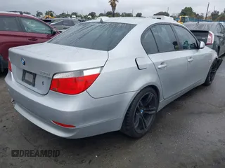 2007 BMW 5 Series 530i with VIN WBANE73507CM46579, listed as a IAAI auction lot 41511577 with 168,904 mi miles. Bid and sale history available at carsss.com. Image 4.