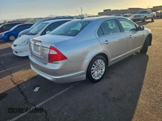 2011 Ford Fusion Hybrid with VIN 3FADP0L36BR251407, listed as a Copart auction lot 46709665 with 129,972 mi miles and Clean Title. Bid and sale history available at carsss.com. Image 4.
