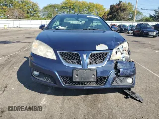 2009 Pontiac G6 with VIN 1G2ZK36NX94268084, listed as a Copart auction lot 70963194 with 120,696 mi miles and Salvage title. Bid and sale history available at DreamBid. Image 5.
