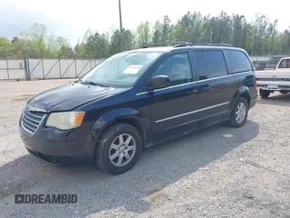 2010 Chrysler Town & Country Touring with VIN 2A4RR5DX5AR329523, listed as a IAAI auction lot 41941874 with 207,079 mi miles. Bid and sale history available at carsss.com. Image 2.