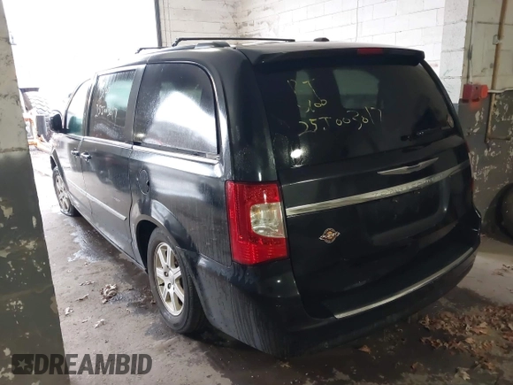 2011 Chrysler Town & Country Touring with VIN 2A4RR5DGXBR745293, listed as a IAAI auction lot 41862089 with 999,999 mi miles. Bid and sale history available at carsss.com. Image 3.