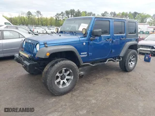 2010 Jeep Wrangler Unlimited Sport with VIN 1J4BA3H11AL144560, listed as a IAAI auction lot 42013032 with 226,233 mi miles. Bid and sale history available at carsss.com. Image 17.