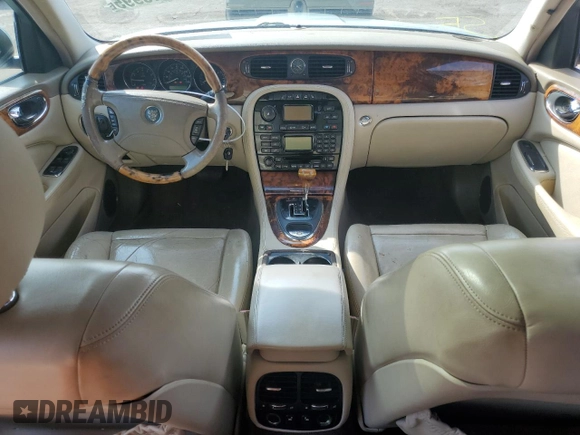 2004 Jaguar XJ with VIN SAJWA71C94SG24466, listed as a Copart auction lot 46610995 with 173,570 mi miles and Salvage Title. Bid and sale history available at carsss.com. Image 8.
