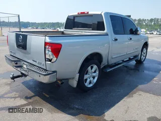 2010 Nissan Titan SE with VIN 1N6BA0ED3AN324773, listed as a IAAI auction lot 41982313 with 270,002 mi miles. Bid and sale history available at carsss.com. Image 4.
