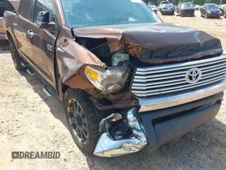 2014 Toyota Tundra Limited with VIN 5TFHW5F19EX400636, listed as a IAAI auction lot 42626818 with 267,402 mi miles and . Bid and sale history available at DreamBid. Image 17.