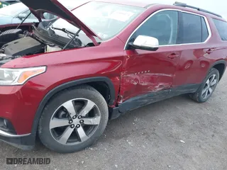 2019 Chevrolet Traverse LT Leather with VIN 1GNEVHKW1KJ164692, listed as a IAAI auction lot 41800874 with 76,866 mi miles. Bid and sale history available at carsss.com. Image 6.