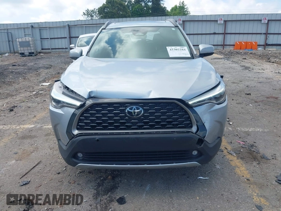 2023 Toyota Corolla Cross XLE with VIN 7MUDAAAG0PV057750, listed as a IAAI auction lot 42302284 with 31,404 mi miles and . Bid and sale history available at DreamBid. Image 6.