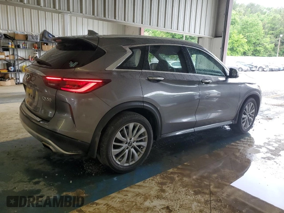 2023 Infiniti QX50 Luxe z VIN 3PCAJ5BA7PF103254, wystawiony jako Copart lot #54495665 z przebiegiem 51 514 mil mil oraz Szkoda całkowita • Salvage title. Historia ofert i sprzedaży dostępna na DreamBid. Obrazek 3.