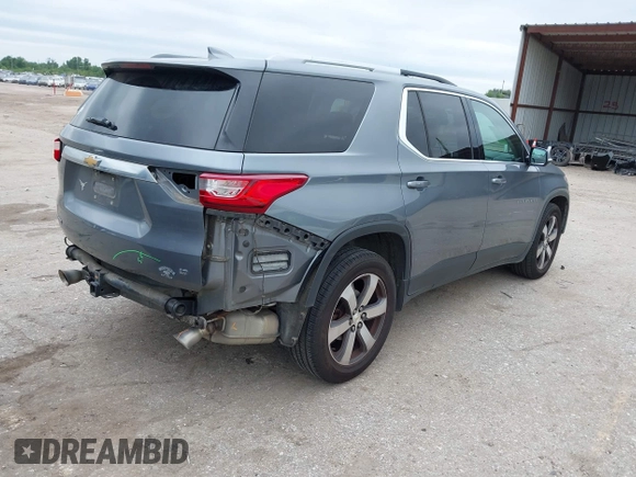 2018 Chevrolet Traverse LT z VIN 1GNERHKW3JJ135861, wystawiony jako IAAI lot #42189570 z przebiegiem 180 113 mil mil oraz . Historia ofert i sprzedaży dostępna na DreamBid. Obrazek 4.