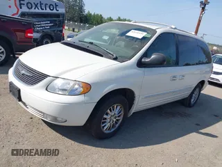 2003 Chrysler Town & Country Limited with VIN 2C8GP64L13R205501, listed as a IAAI auction lot 42131935 with 158,009 mi miles. Bid and sale history available at carsss.com. Image 2.