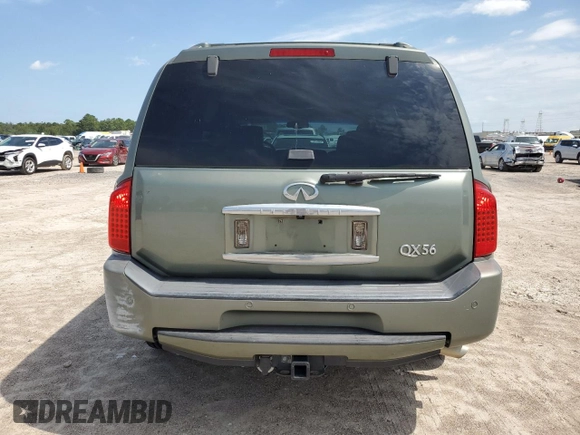 2004 Infiniti QX56 with VIN 5N3AA08A44N807454, listed as a Copart auction lot 71940494 with 232,981 mi miles and Salvage Title. Bid and sale history available at carsss.com. Image 6.