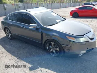 2009 Acura TL Technology z VIN 19UUA96579A005856, wystawiony jako IAAI lot #42117231 z przebiegiem 180 503 mil mil oraz . Historia ofert i sprzedaży dostępna na DreamBid. Obrazek 1.
