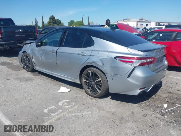 2020 Toyota Camry XSE with VIN 4T1K61AK1LU318098, listed as a IAAI auction lot 41838182 with 64,118 mi miles and . Bid and sale history available at DreamBid. Image 3.