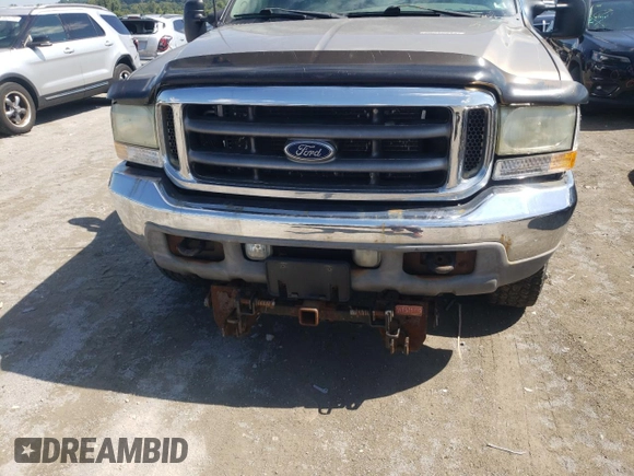2002 Ford Super Duty F-250 XL with VIN 1FTNW21L12EB95783, listed as a Copart auction lot 58675472 with 203,007 mi miles and Salvage Title. Bid and sale history available at carsss.com. Image 9.