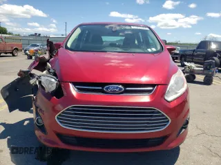 2015 Ford C-Max Energi SEL with VIN 1FADP5CU2FL117827, listed as a Copart auction lot 61459354 with 133,474 mi miles and Clean Title. Bid and sale history available at carsss.com. Image 5.