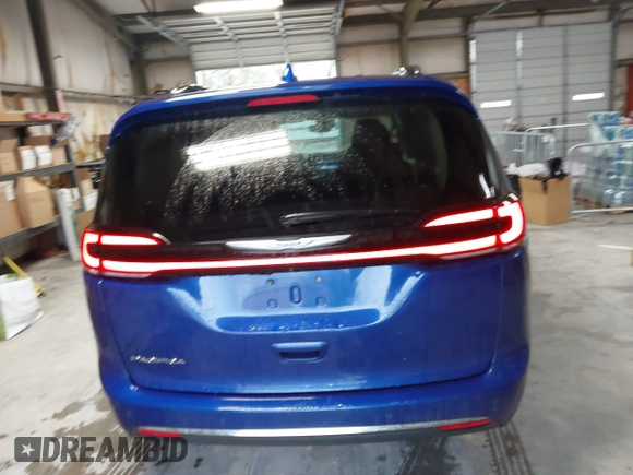2021 Chrysler Pacifica Touring L z VIN 2C4RC1BGXMR503108, wystawiony jako IAAI lot #41914136 z przebiegiem 98 685 mil mil oraz . Historia ofert i sprzedaży dostępna na DreamBid. Obrazek 16.