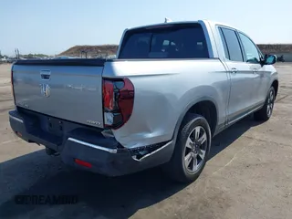 2019 Honda Ridgeline RTL-E with VIN 5FPYK3F79KB029771, listed as a IAAI auction lot 42448369 with 90,142 mi miles and . Bid and sale history available at DreamBid. Image 6.