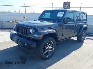 2024 Jeep Wrangler Sport S with VIN 1C4RJXN61RW192386, listed as a IAAI auction lot 42001810 with 7,426 mi miles and . Bid and sale history available at DreamBid. Image 17.