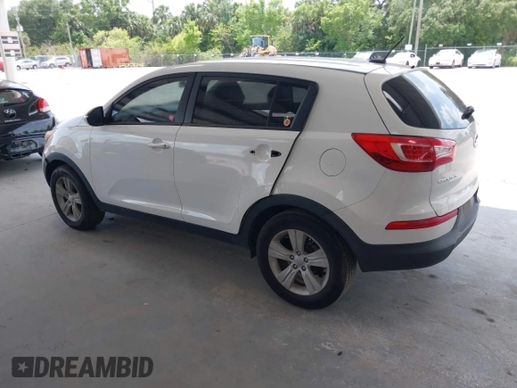 2013 Kia Sportage LX z VIN KNDPB3A2XD7521010, wystawiony jako IAAI lot #42297975 z przebiegiem 134 826 mil mil oraz . Historia ofert i sprzedaży dostępna na DreamBid. Obrazek 3.