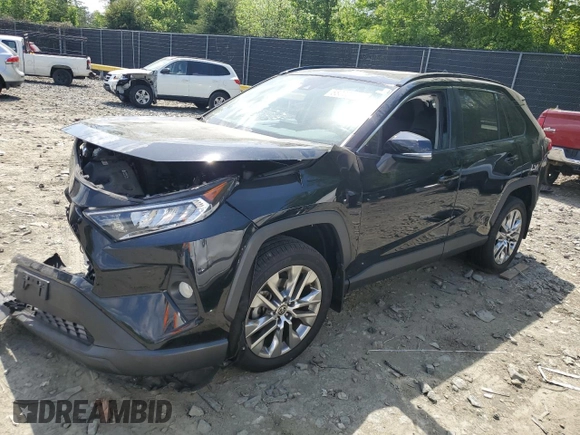 2021 Toyota RAV4 XLE Premium with VIN 2T3A1RFV3MC195877, listed as a Copart auction lot 55220955 with 92,679 mi miles and Salvage title. Bid and sale history available at DreamBid. Image 1.