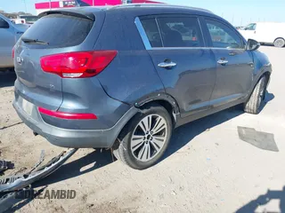 2015 Kia Sportage EX with VIN KNDPC3AC4F7709546, listed as a IAAI auction lot 40968676 with 129,743 mi miles and . Bid and sale history available at DreamBid. Image 4.