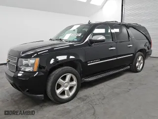 2013 Chevrolet Suburban LTZ with VIN 1GNSKKE79DR371333, listed as a Copart auction lot 74394354 with 165,171 mi miles and Clean Title. Bid and sale history available at carsss.com. Image 1.
