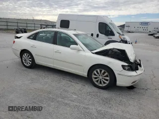 2006 Hyundai Azera SE z VIN KMHFC46F26A046383, wystawiony jako Copart lot #47971535 z przebiegiem 306 323 mil mil oraz Szkoda całkowita • Salvage title. Historia ofert i sprzedaży dostępna na DreamBid. Obrazek 4.