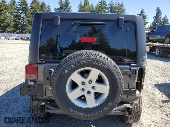 2018 Jeep Wrangler JK Unlimited Sport S with VIN 1C4HJWDG7JL929337, listed as a Copart auction lot 69376174 with 101,313 mi miles and Salvage Title. Bid and sale history available at carsss.com. Image 6.