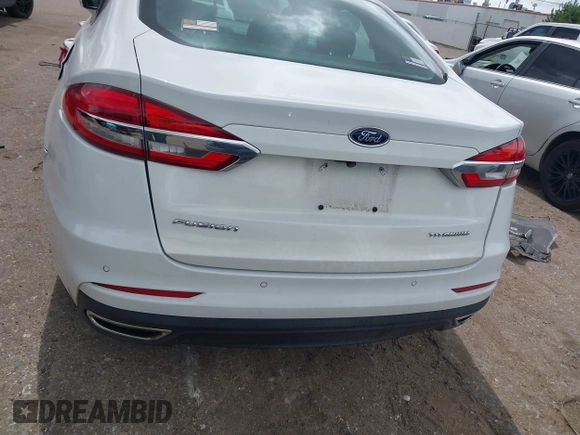 2020 Ford Fusion Titanium с VIN 3FA6P0D98LR151810, выставлен на аукционе IAAI как лот 42590902 с пробегом 76 624 миль миль и . История ставок и продаж доступна на DreamBid. Изображение 16.