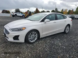 2020 Ford Fusion Hybrid SEL with VIN 3FA6P0MU8LR189560, listed as a Copart auction lot 76598364 with 57,443 mi miles and Salvage Title. Bid and sale history available at carsss.com. Image 1.