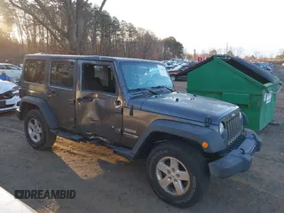 2018 Jeep Wrangler JK Unlimited Sport with VIN 1C4BJWDG2JL810424, listed as a IAAI auction lot 41610669 with 73,830 mi miles. Bid and sale history available at carsss.com. Image 13.