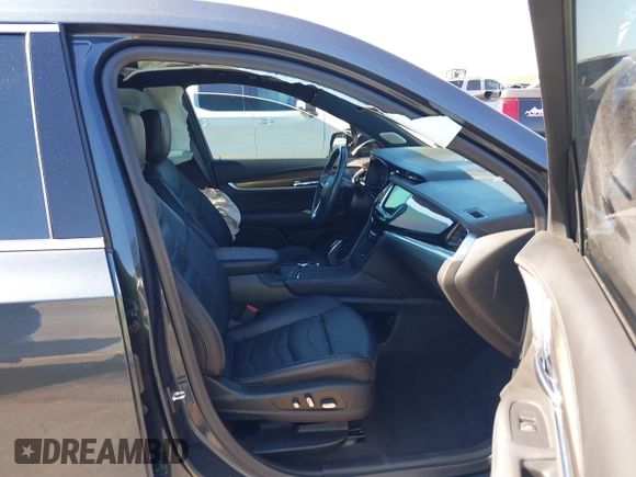 2021 Cadillac XT6 Premium Luxury with VIN 1GYKPERS0MZ110029, listed as a IAAI auction lot 41669104 with 58,890 mi miles and . Bid and sale history available at DreamBid. Image 5.
