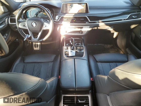 2017 BMW 7 Series 740i with VIN WBA7E2C32HG740988, listed as a Copart auction lot 49613465 with 63,646 mi miles and Salvage Title. Bid and sale history available at carsss.com. Image 8.