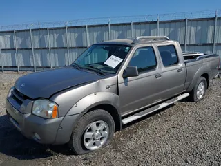 2003 Nissan Frontier SE z VIN 1N6ED29X43C402027, wystawiony jako IAAI lot #42252471 z przebiegiem 104 233 mil mil oraz . Historia ofert i sprzedaży dostępna na DreamBid. Obrazek 6.