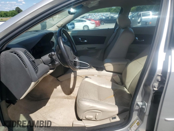 2004 Cadillac CTS with VIN 1G6DM577140143103, listed as a Copart auction lot 52082795 with 137,393 mi miles and Salvage title. Bid and sale history available at DreamBid. Image 7.