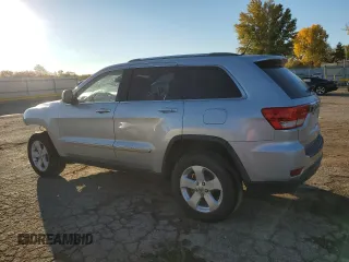 2012 Jeep Grand Cherokee Laredo with VIN 1C4RJEAG1CC354819, listed as a Copart auction lot 78532794 with 142,474 mi miles and Salvage Title. Bid and sale history available at carsss.com. Image 2.