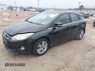 2012 Ford Focus SEL with VIN 1FAHP3M28CL336001, listed as a IAAI auction lot 40876771 with 147,017 mi miles. Bid and sale history available at carsss.com. Image 2.