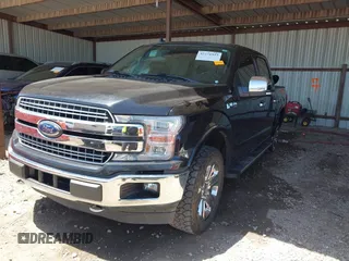 2020 Ford F-150 XL with VIN 1FTEW1E49LKF46410, listed as a IAAI auction lot 42271933 with 100,958 mi miles and . Bid and sale history available at DreamBid. Image 2.