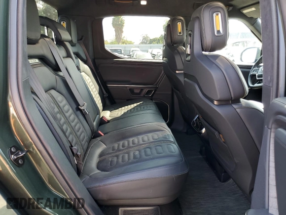 2023 Rivian R1T Adventure z VIN 7FCTGAAA9PN018171, wystawiony jako Copart lot #72593614 z przebiegiem 12 553 mil mil oraz Szkody całkowita. Historia ofert i sprzedaży dostępna na DreamBid. Obrazek 10.