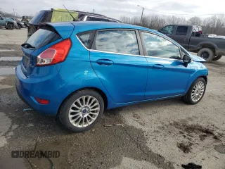 2015 Ford Fiesta Titanium z VIN 3FADP4FJ7FM120958, wystawiony jako Copart lot #85260204 z przebiegiem 144 587 mil mil oraz Szkoda całkowita • Salvage title. Historia ofert i sprzedaży dostępna na DreamBid. Obrazek 3.