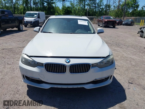 2013 BMW 3 Series 328i xDrive with VIN WBA3B5C51DJ599144, listed as a IAAI auction lot 42059260 with 84,153 mi miles. Bid and sale history available at carsss.com. Image 6.
