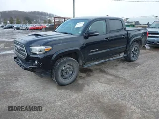 2016 Toyota Tacoma SR with VIN 3TMCZ5AN2GM027945, listed as a IAAI auction lot 41446277 with 51,781 mi miles and . Bid and sale history available at DreamBid. Image 18.