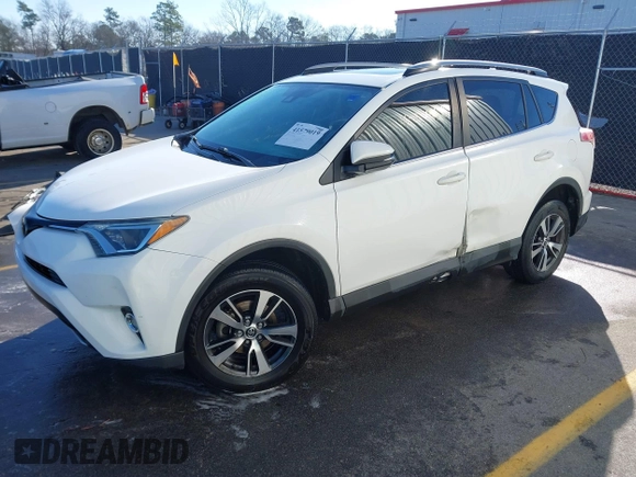 2018 Toyota RAV4 XLE with VIN JTMWFREV7JJ743297, listed as a IAAI auction lot 41579019 with 102,442 mi miles. Bid and sale history available at carsss.com. Image 2.